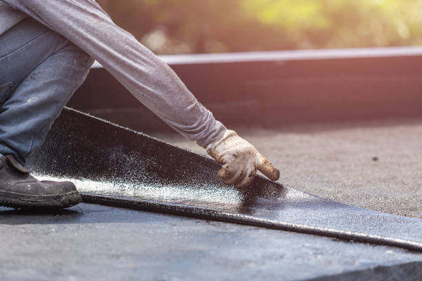 Professional Basement Waterproofing technician working in Trenton, IL